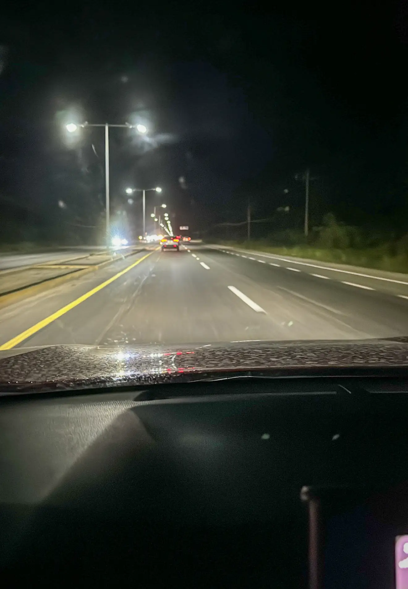 Nighttime drive on the Cancun to Tulum highway.