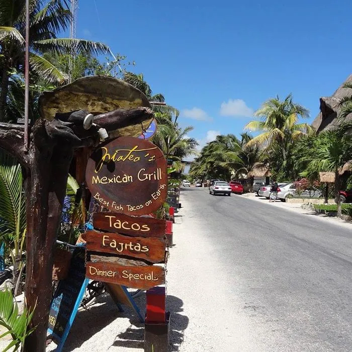 Rustic hotel area in Tulum, nestled within the lush jungle setting.