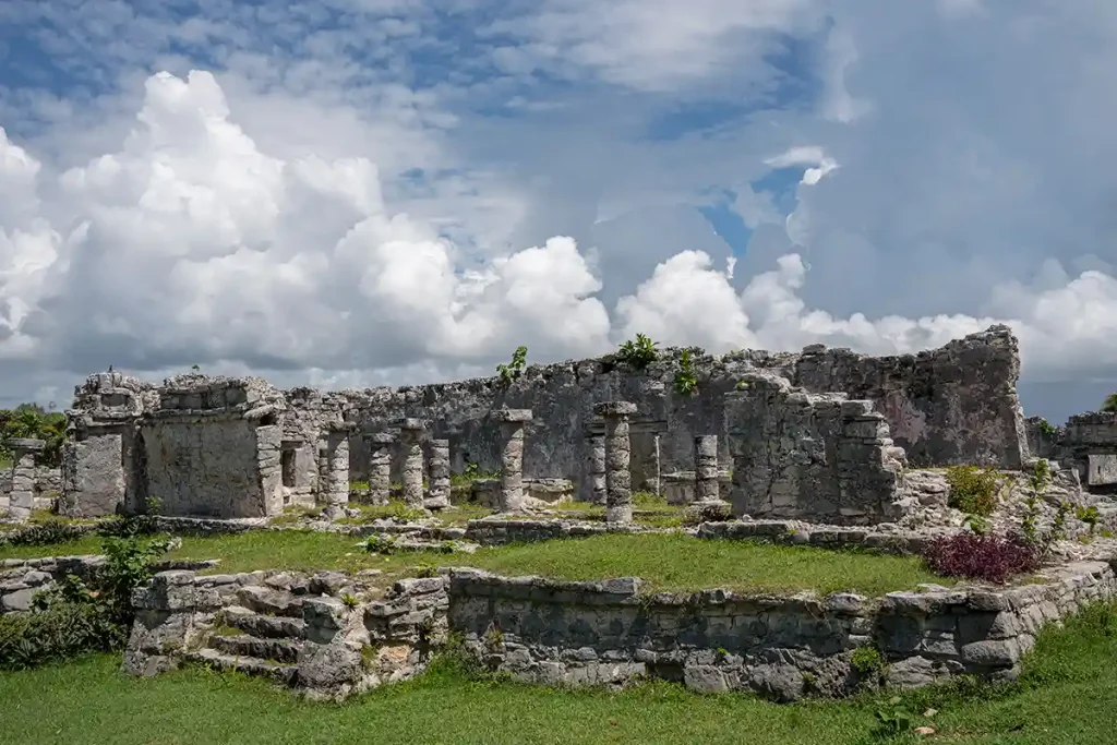 House of the Columns in Tulum, a partially preserved Mayan ruin featuring multiple stone columns.