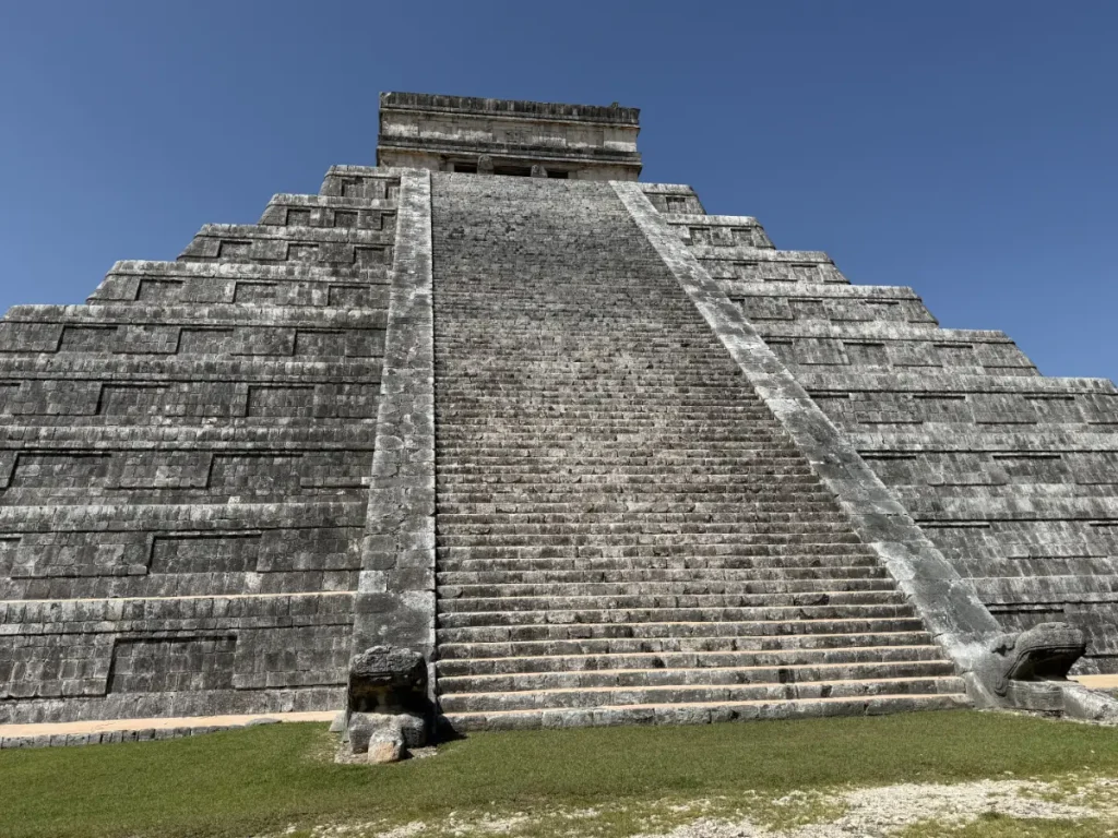 Low-angle view of the Kukulkan pyramid at Chichen Itza.