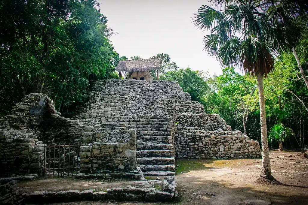 An ancient pyramid made of stone blocks at Coba.