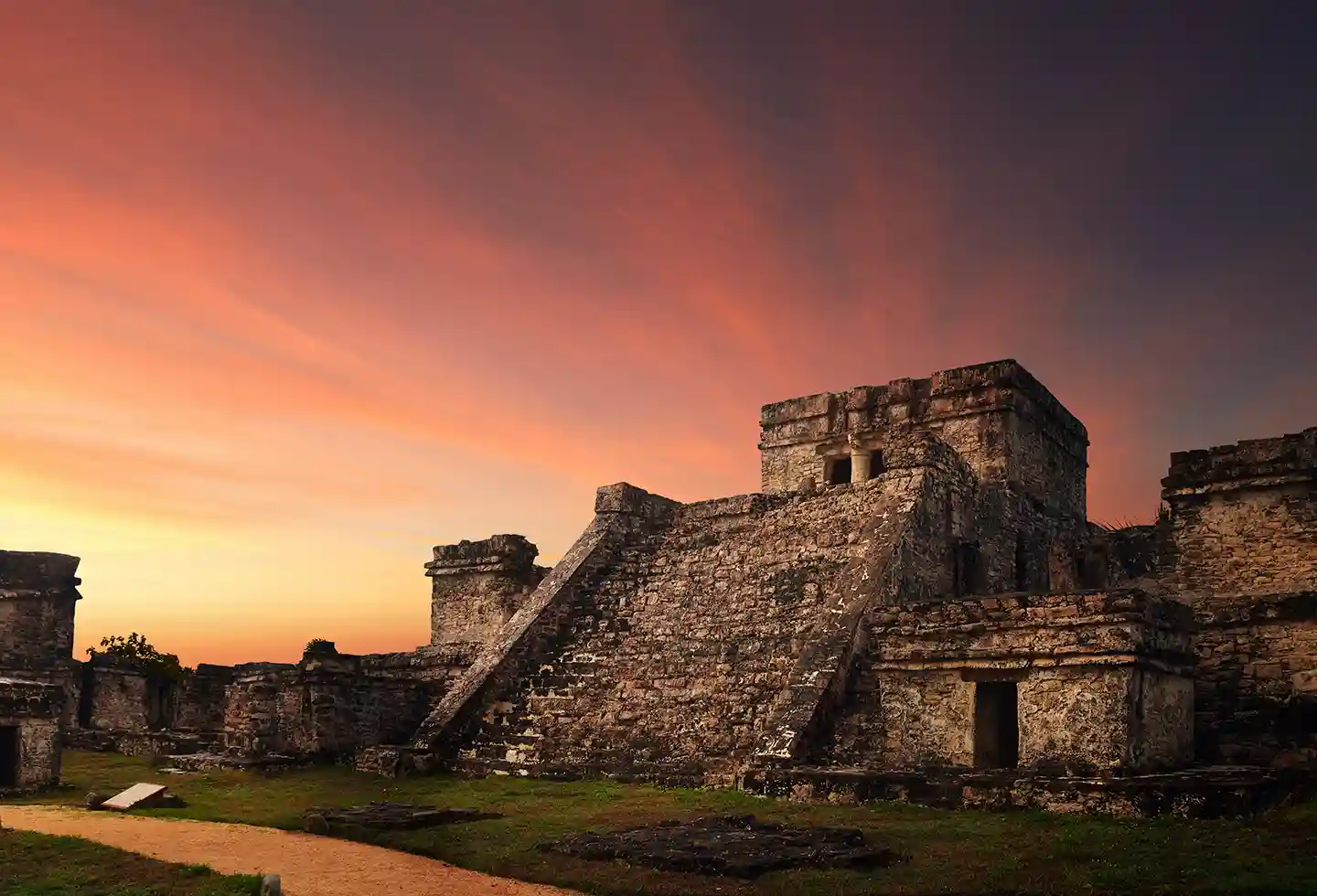 Tulum Mayan ruins at sunset.