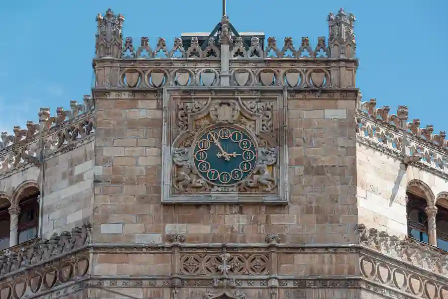 Close-up of the decorative clock on the façade of the Palacio Postal in Mexico City.