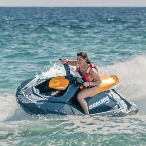 Jet ski adventure in Cabo San Lucas with rider speeding across the Sea of Cortez.