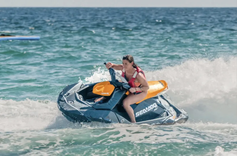 Jet ski adventure in Cabo San Lucas with rider speeding across the Sea of Cortez.