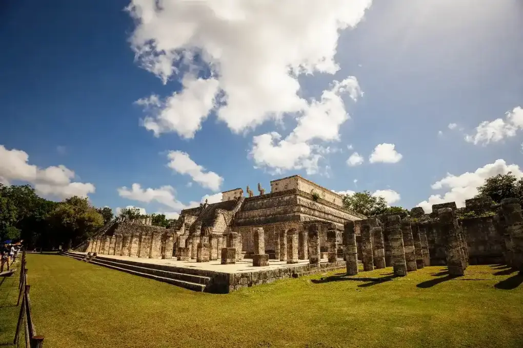 View of the Temple of the Warriors at Chichen Itzá under blue sky